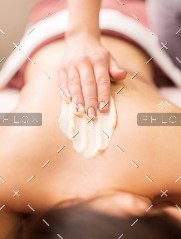 demo-attachment-1042-woman-having-back-massage-with-cream-at-spa-PFCWZ34-1